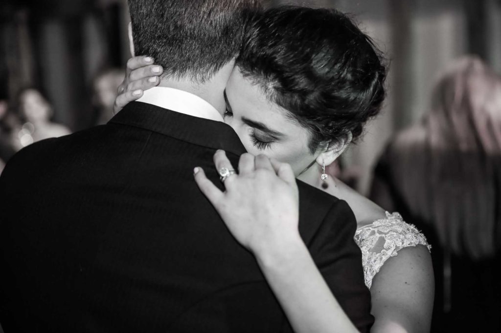 a couple dancing at their wedding at Babington house Somerset Photography shows emotion