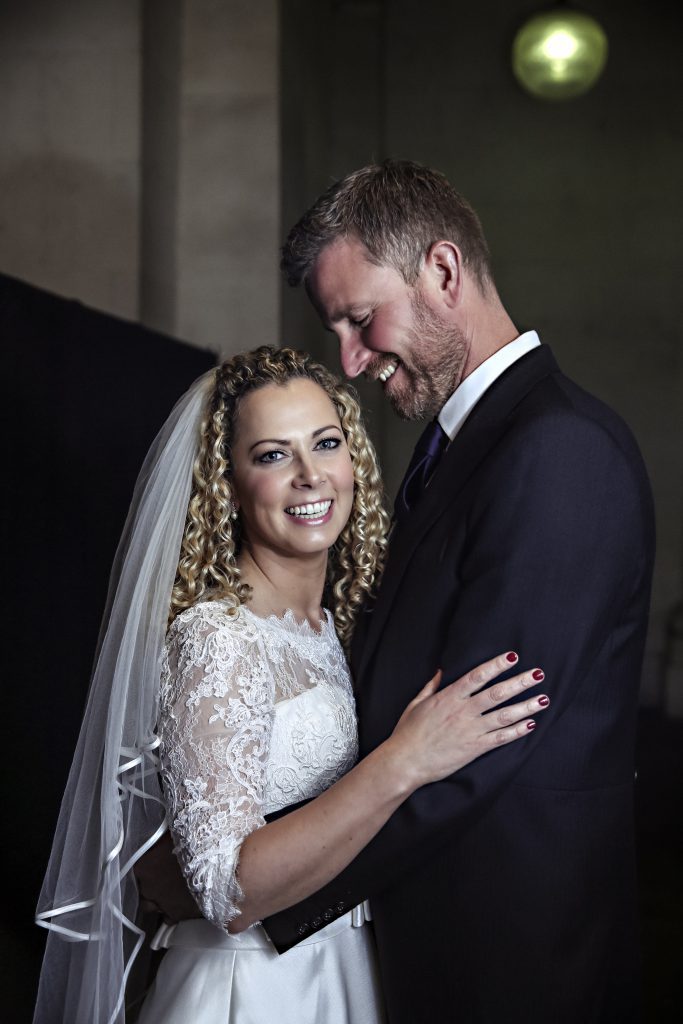 This one was tricky, it was a November wedding, so I had no daylight when it came to the couple shots. I used my off camera flash for this one . This particular bride was quite nervous and was getting quite stressed about it all. To help her relax I instructed the best man to stand to the side of me and yell insults at her new husband, she loved it and I got this great shot!