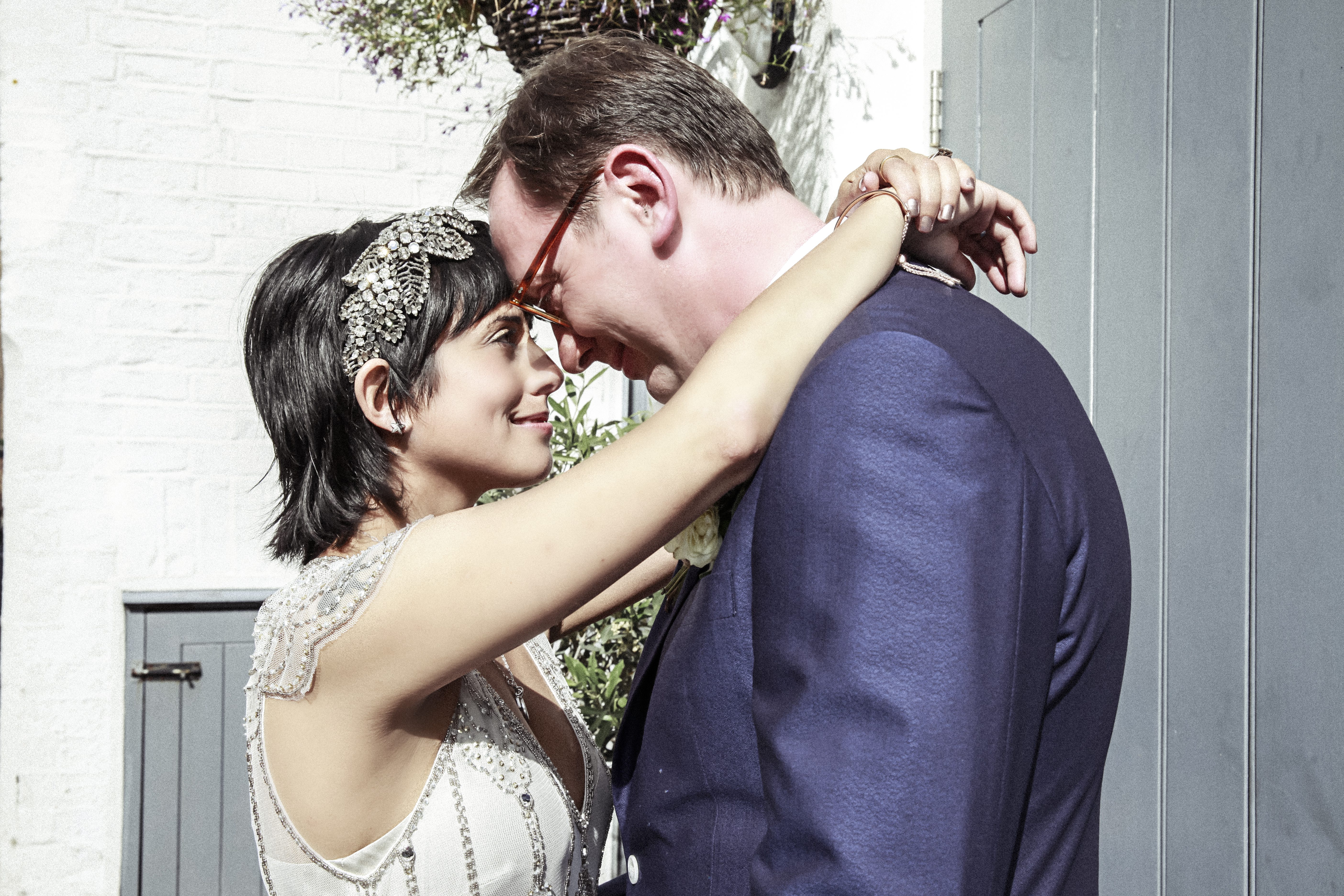 bride and groom head to head wedding photography