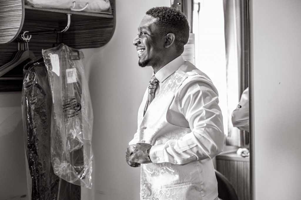 bridegroom getting ready london wedding photographer