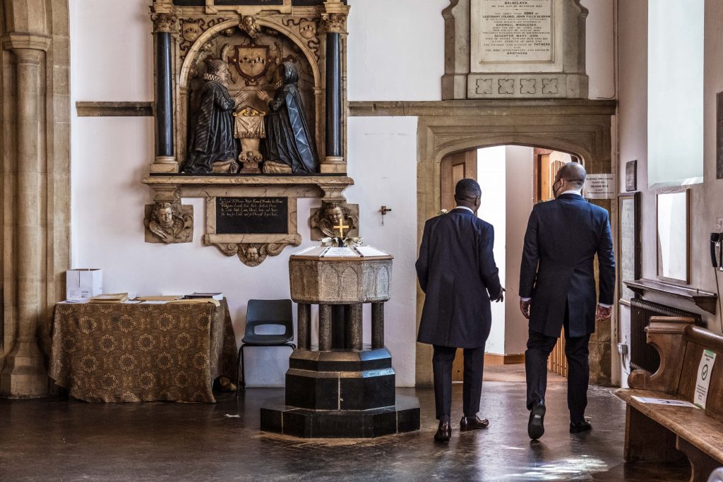 groom and best man at church , london wedding photographer