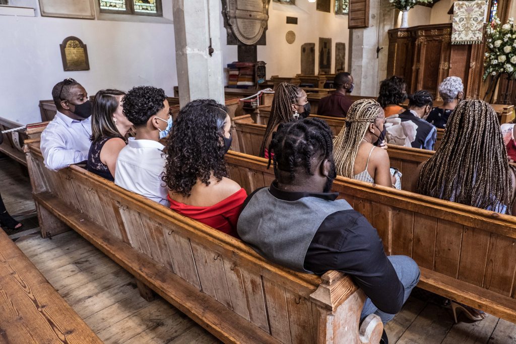 wedding guests sitting in church