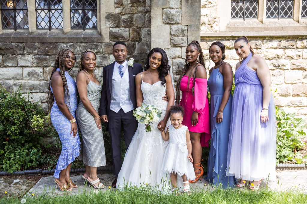 group shot guests outside church wedding