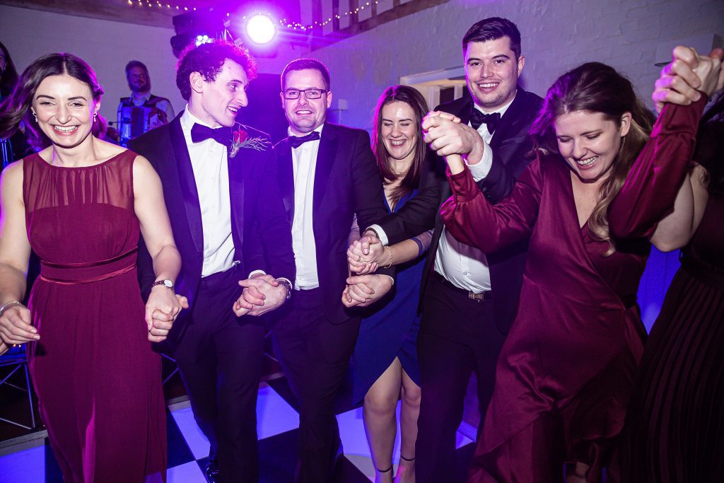 guests dancing, The barns at Alswick, wedding photographer Hertfordshire