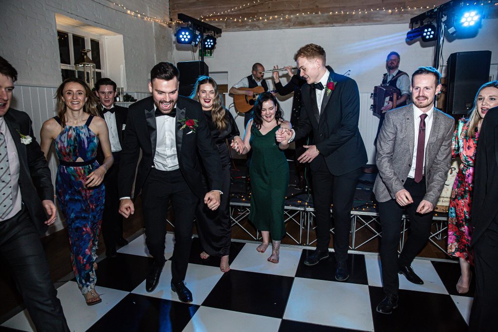 guests dancing, The barns at Alswick, wedding photographer Hertfordshire