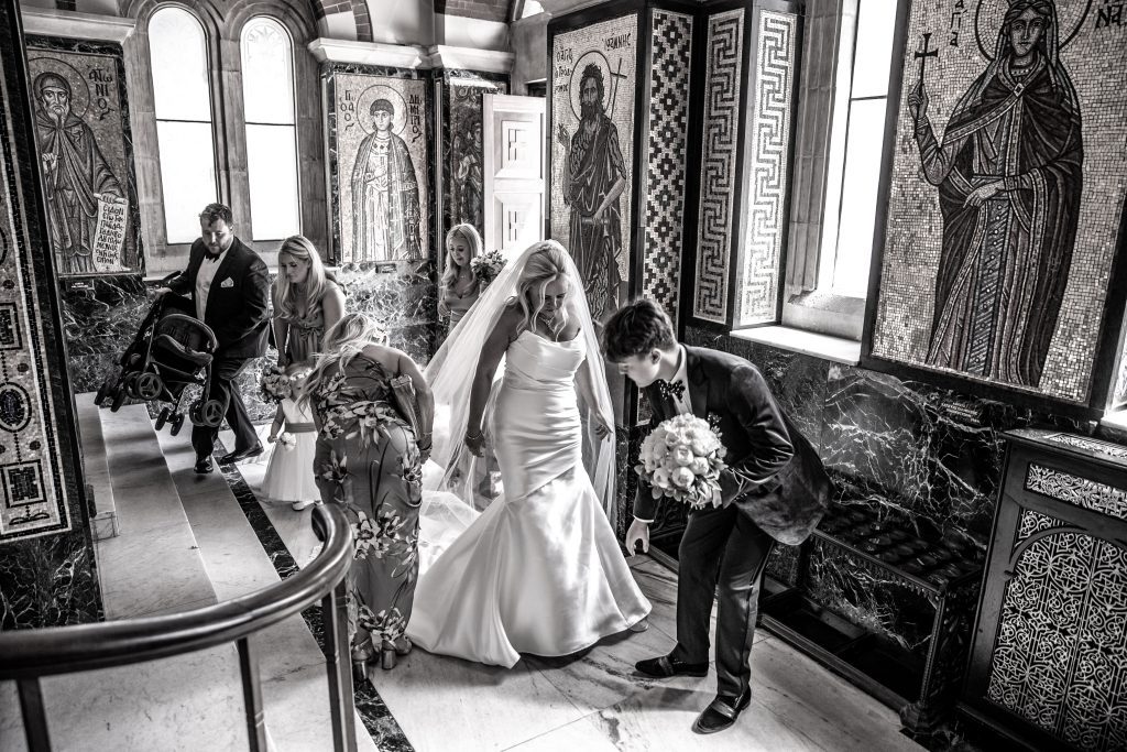 A bride in the entrance to the St Sophia Greek orthodox church in Moscow road