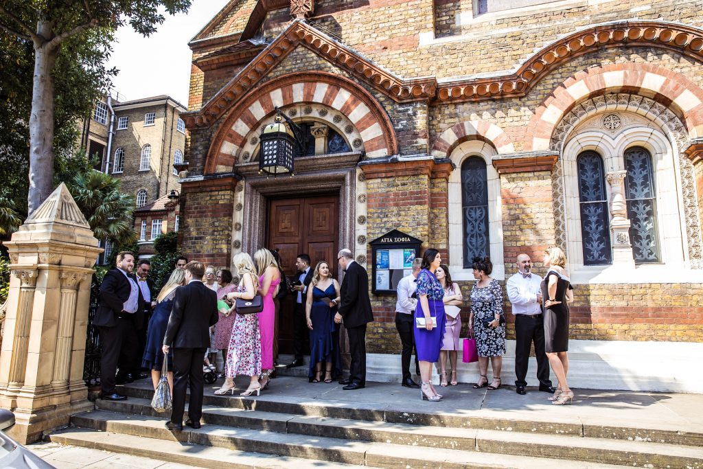 Guests outside St Sophia greek orthodox church in Moscow Road London