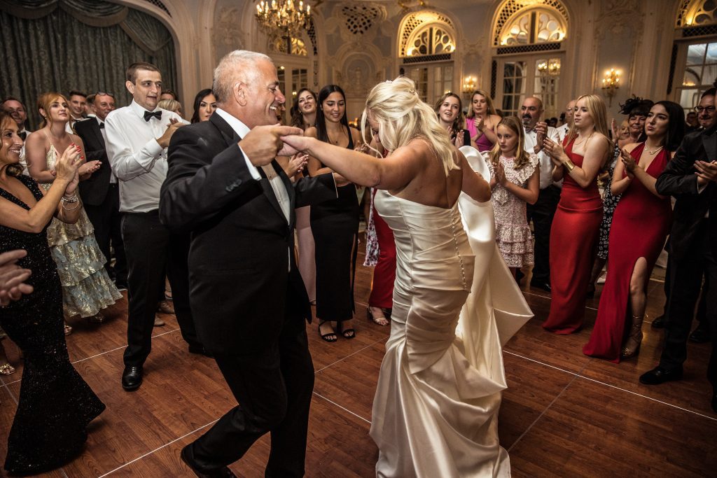 Bride and groom dance at a greek wedding at The Savoy in London