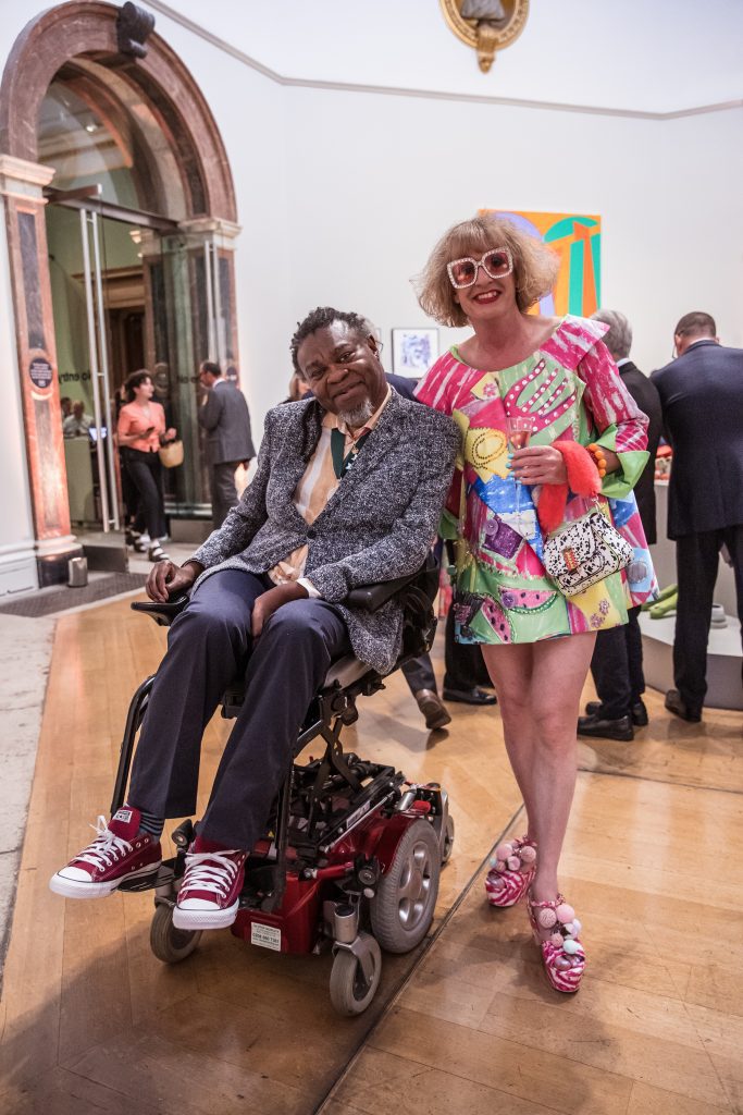 Guests Yinka Shonibare and Grayson Perry at the Royal Academy summer party photographer