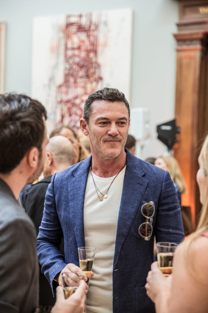 Luke Evans at the Royal Academy summer party photographer
