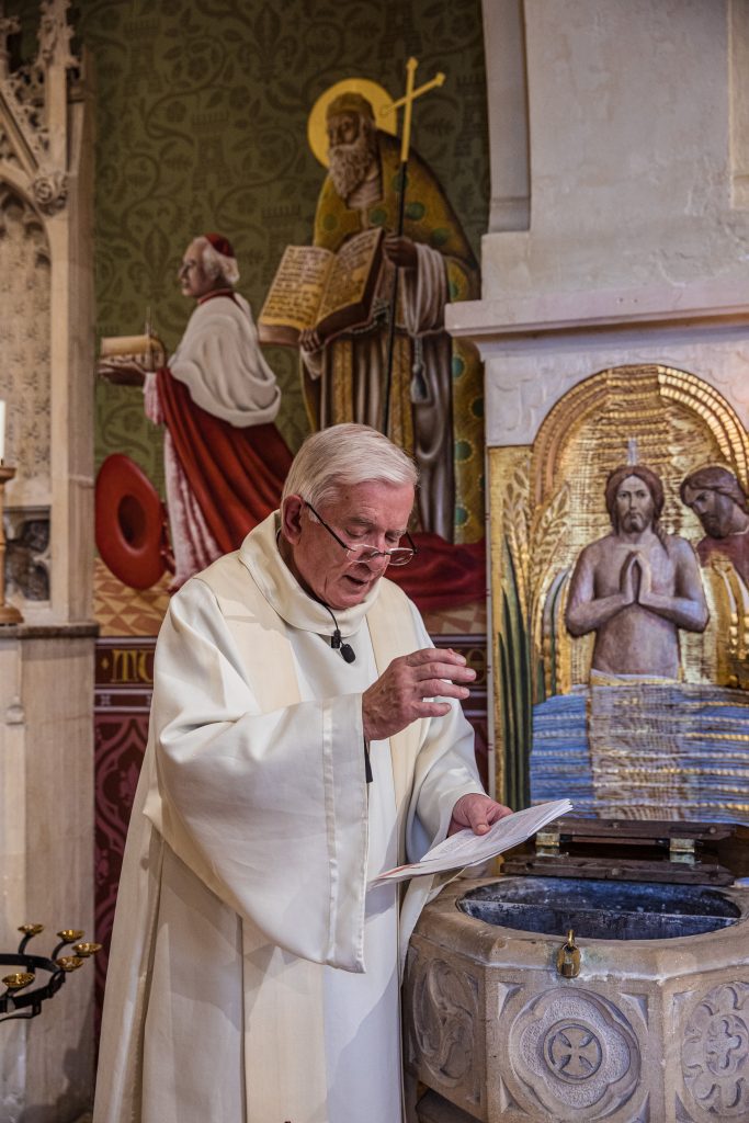 reverend at a Hertford church performing ceremony