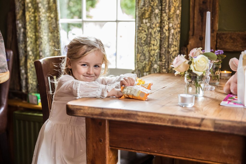 a flower girl at a hertfordshire pub wedding