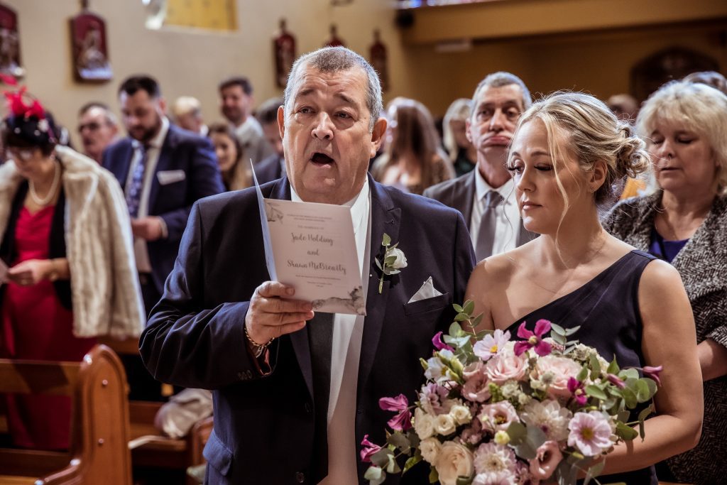 father of the bride sings a hymn