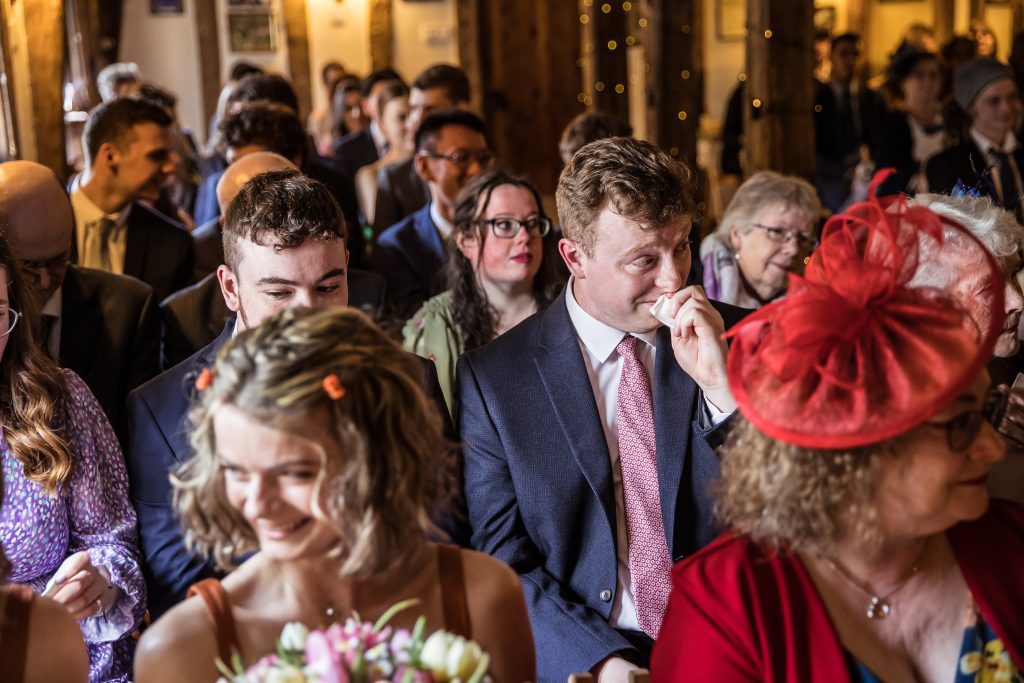 brother of the bride cries during the ceremony at The Barley Townhouse in Royston