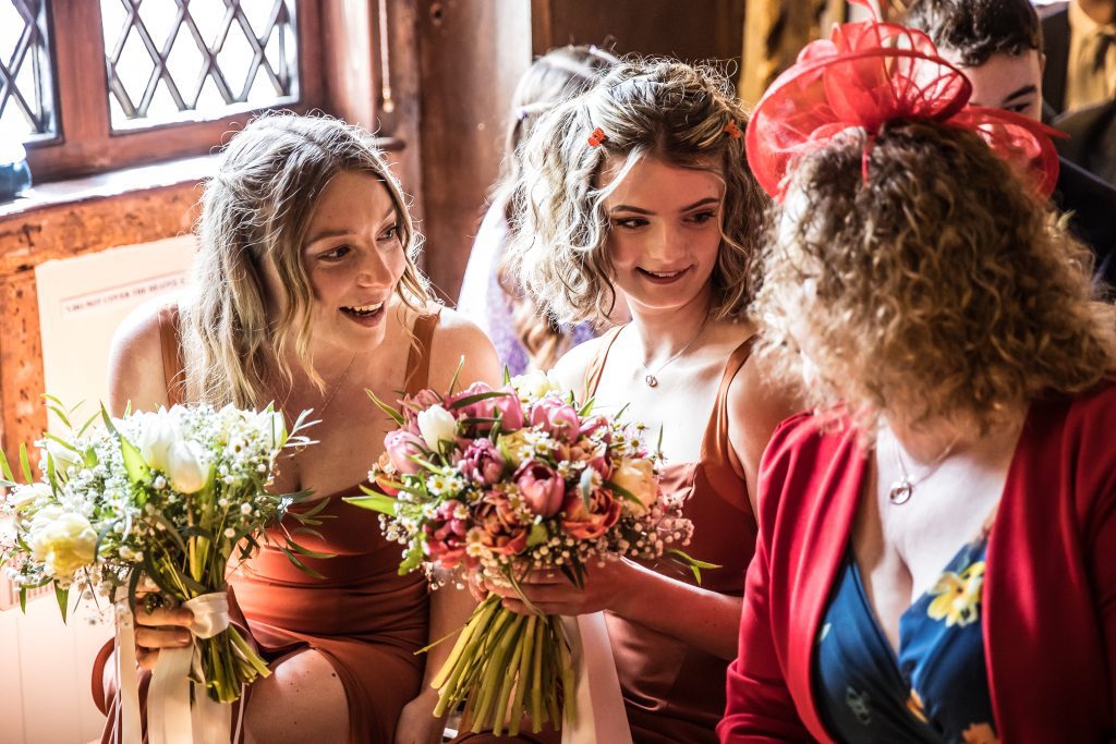 mother of the bride talks to the bridesmaids at The Barley Townhouse wedding