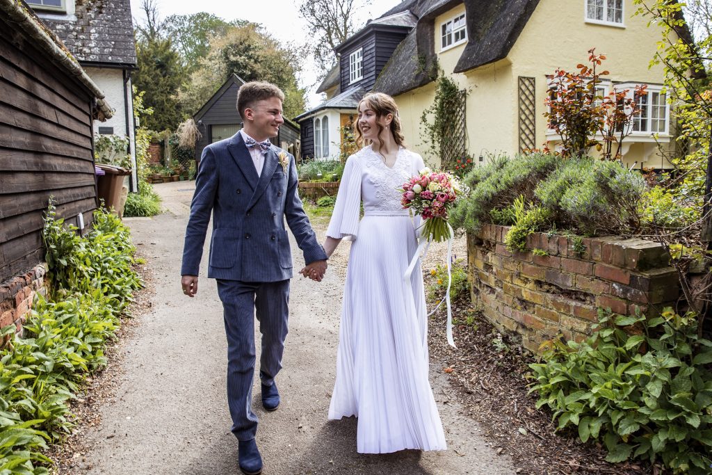 bride and groom outside church in Royston Hertfordshire wedding