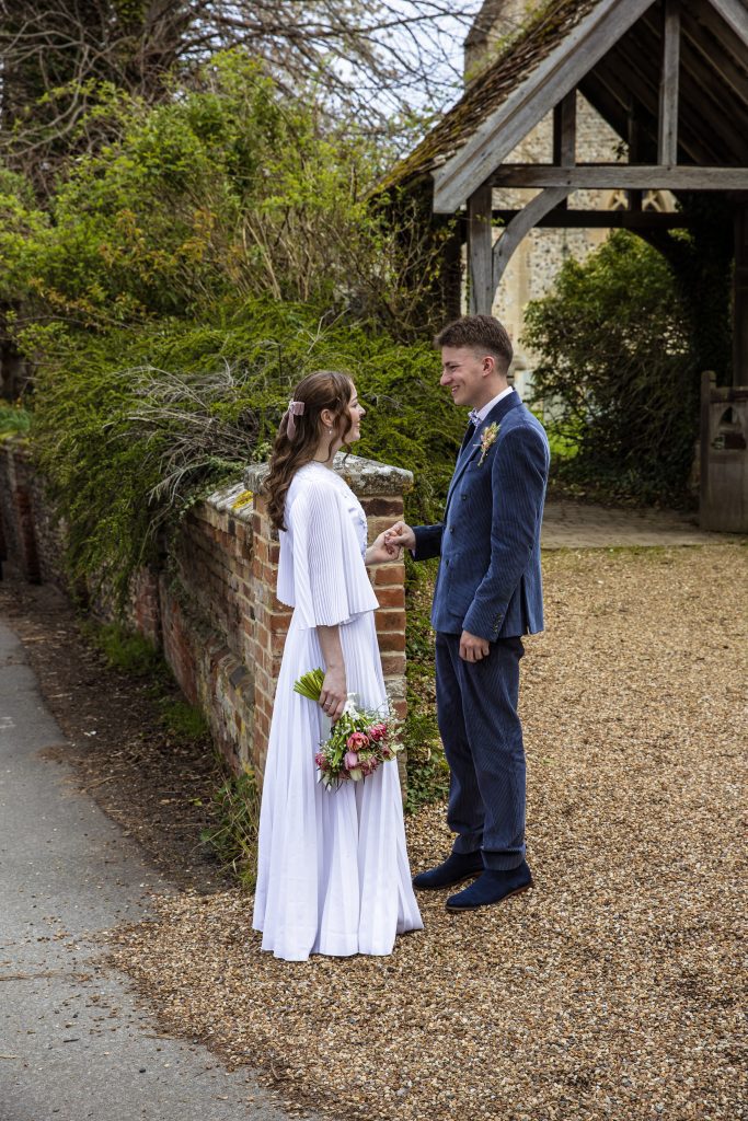 bride and groom outside church in Royston Hertfordshire wedding