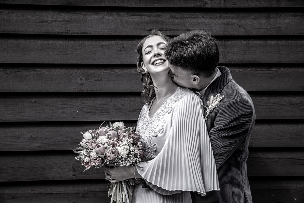 Bride and groom and Barley Town House in Royston. Wedding Photography Natalie Martinez 