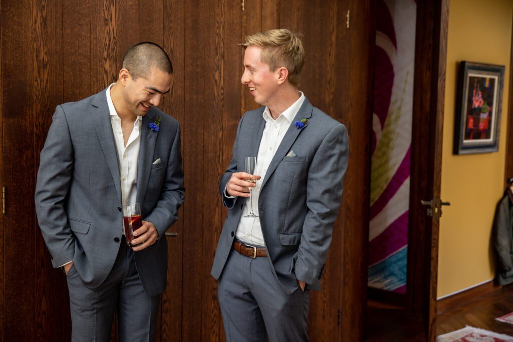 best men share a joke at a hertfordshire wedding