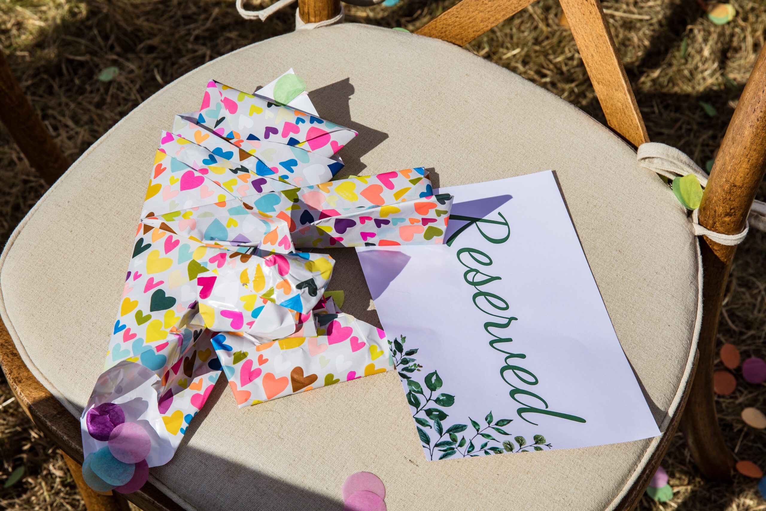 wedding confetti lies on a chair in hertfordshire