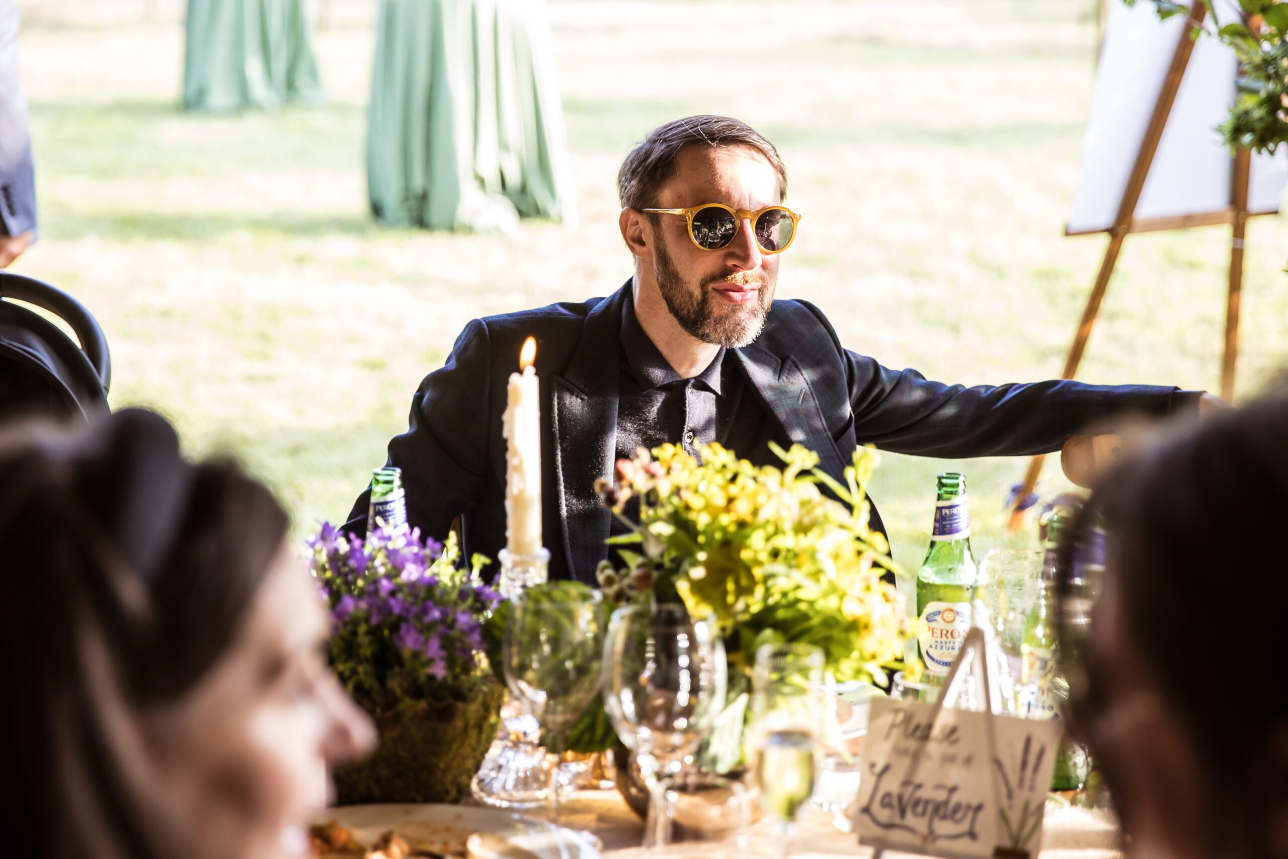 guests smile at a hertfordshire garden wedding