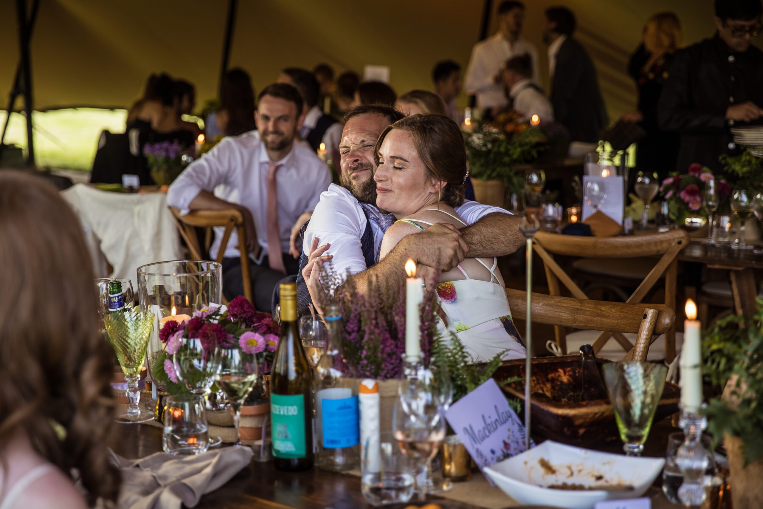 guests smile at a hertfordshire garden wedding