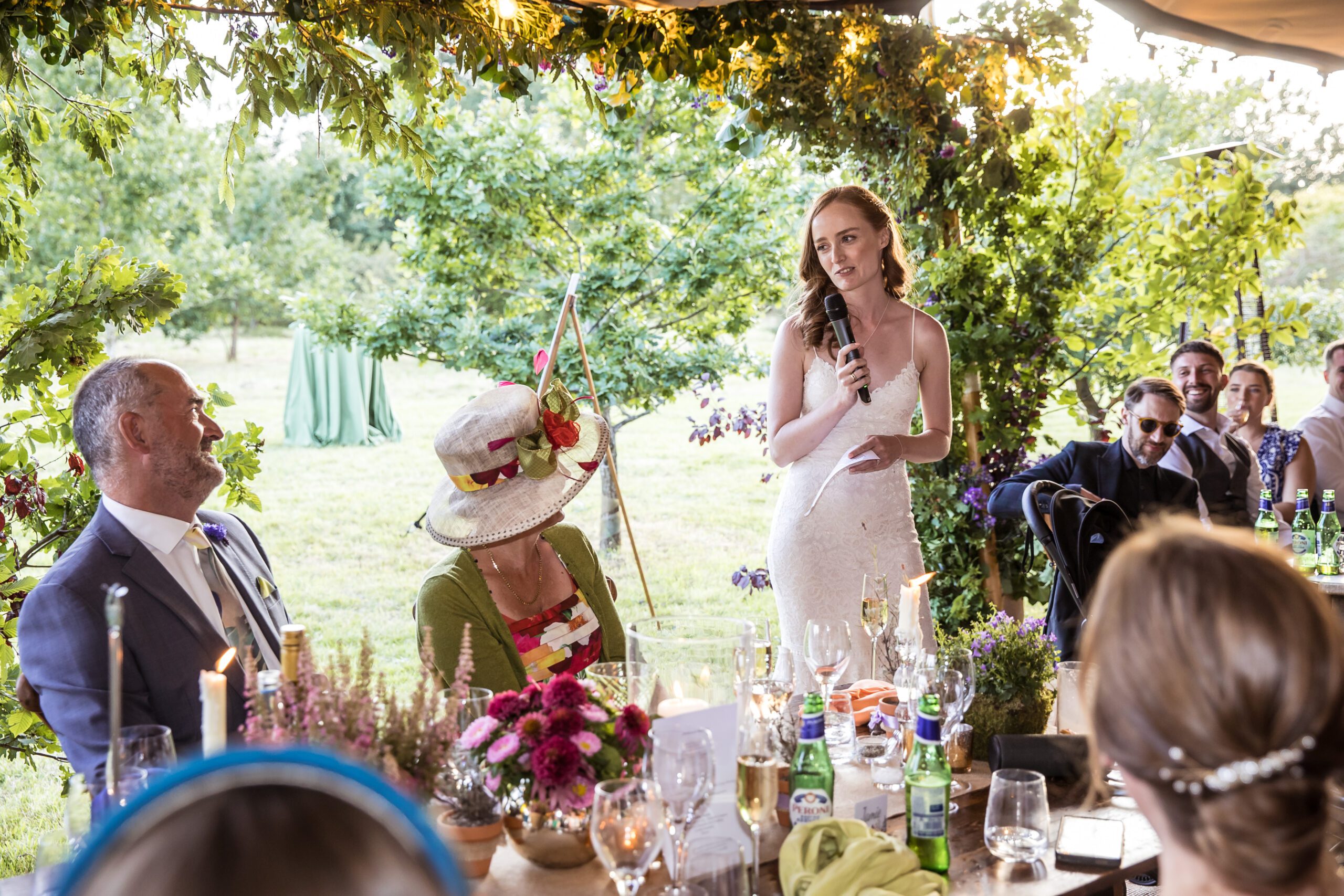 the bride gives a speech at her Hertfordshire garden wedding