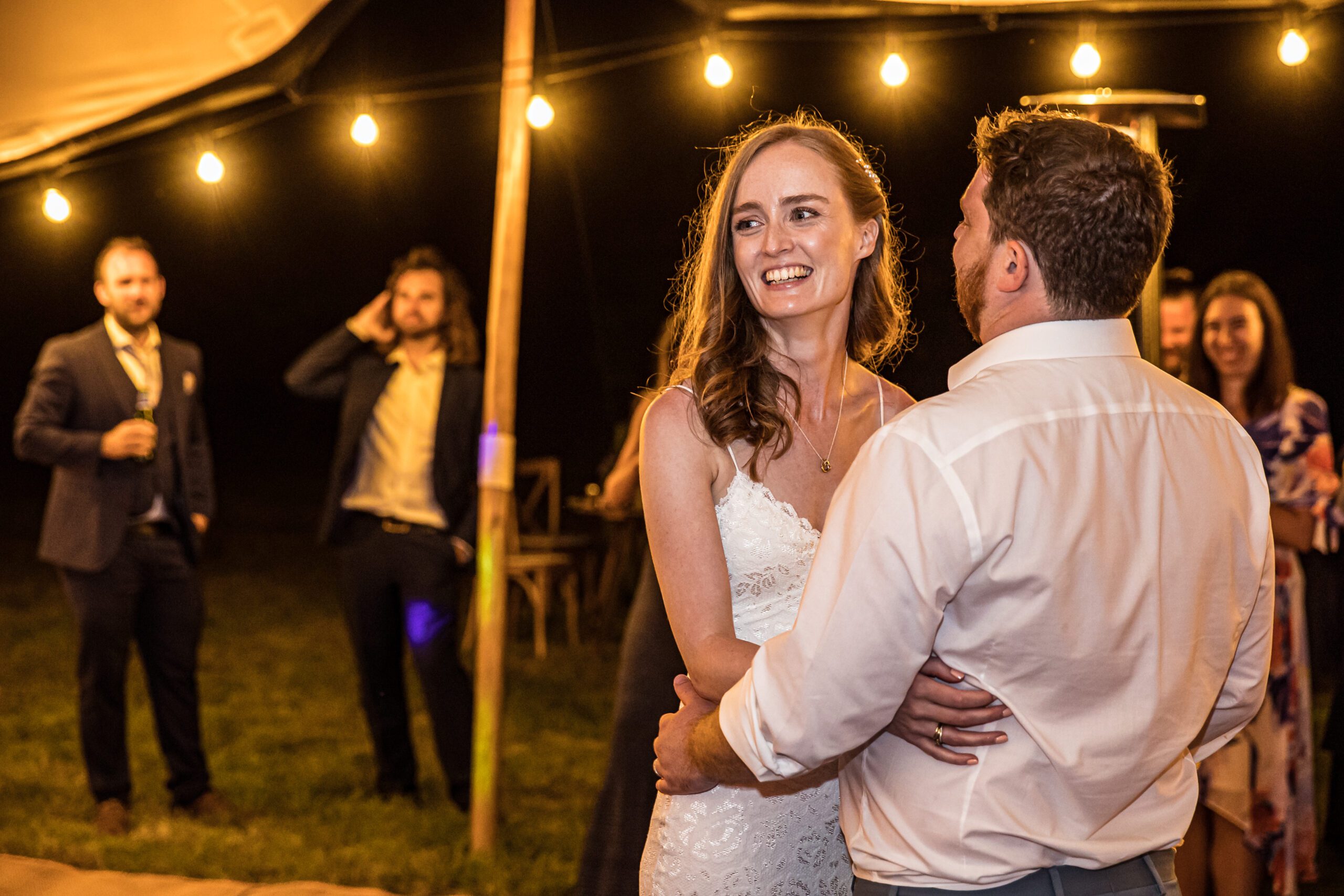 redhead bride performs first dance with her husband at hertfordshire wedding