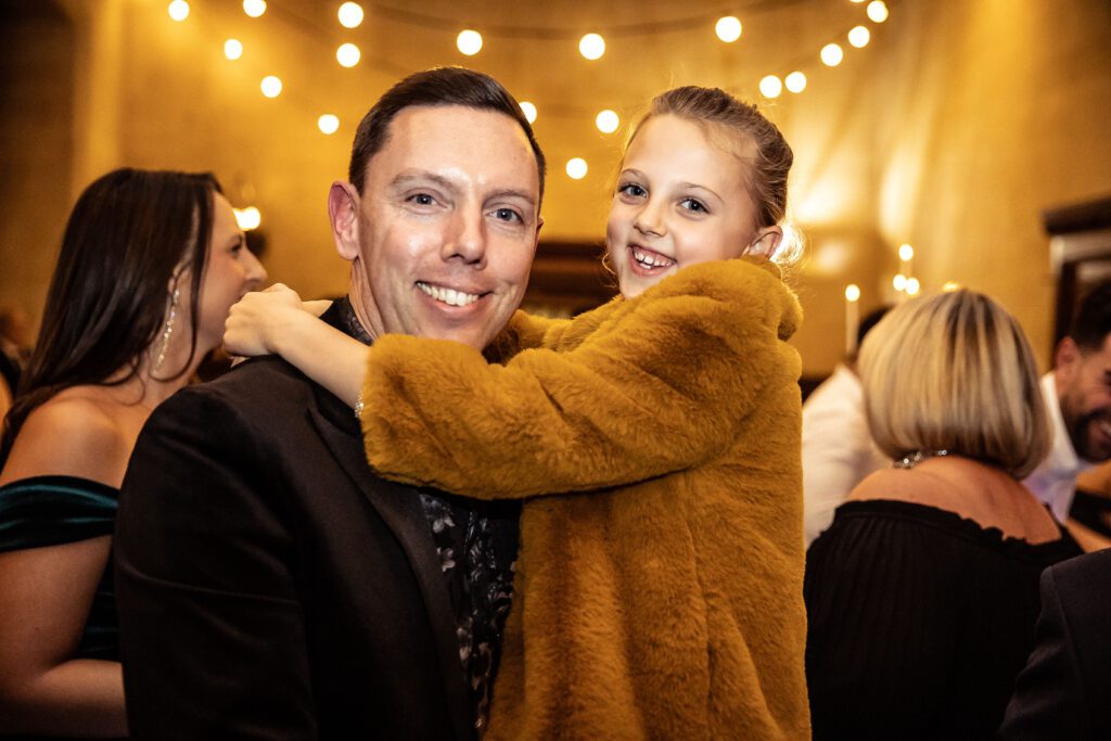 guests on the dance floor at a wedding at Fanhams Hall in Hertfordshire