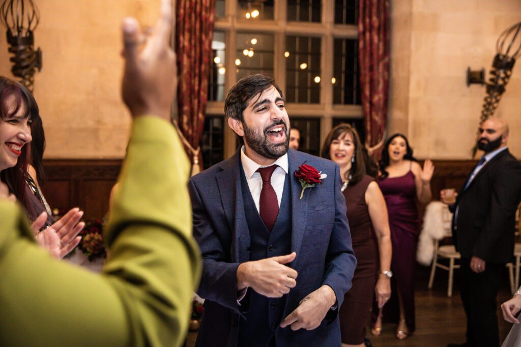 Guests dance at wedding at Fanhams Hall